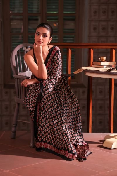Black overall Floral Ajrakh Modal Silk Saree (with Tassels)