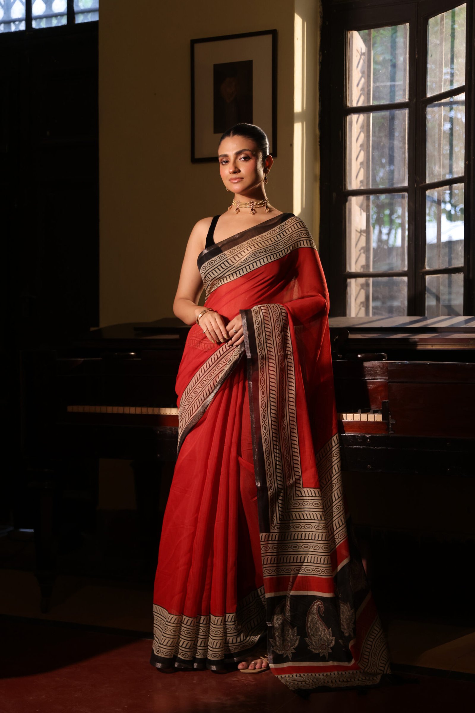 Red linen saree with white & Black ajrakh print