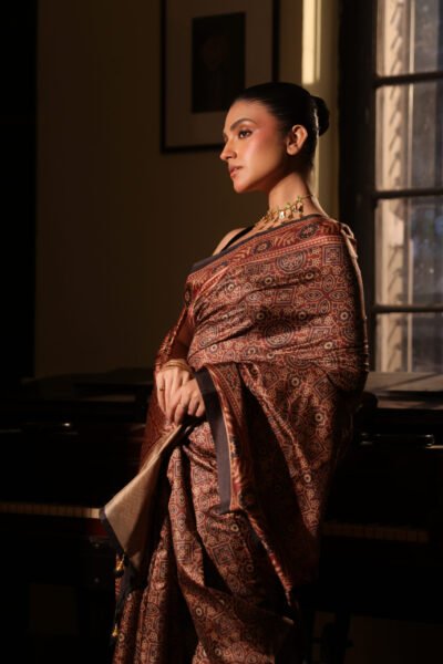 Reddish Brown Geometric Ajrakh Silk Blend Saree (with Tassels)