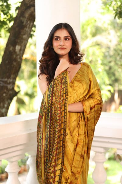 Mustard Solid Ajrakh Modal Silk Saree (with Tassels)